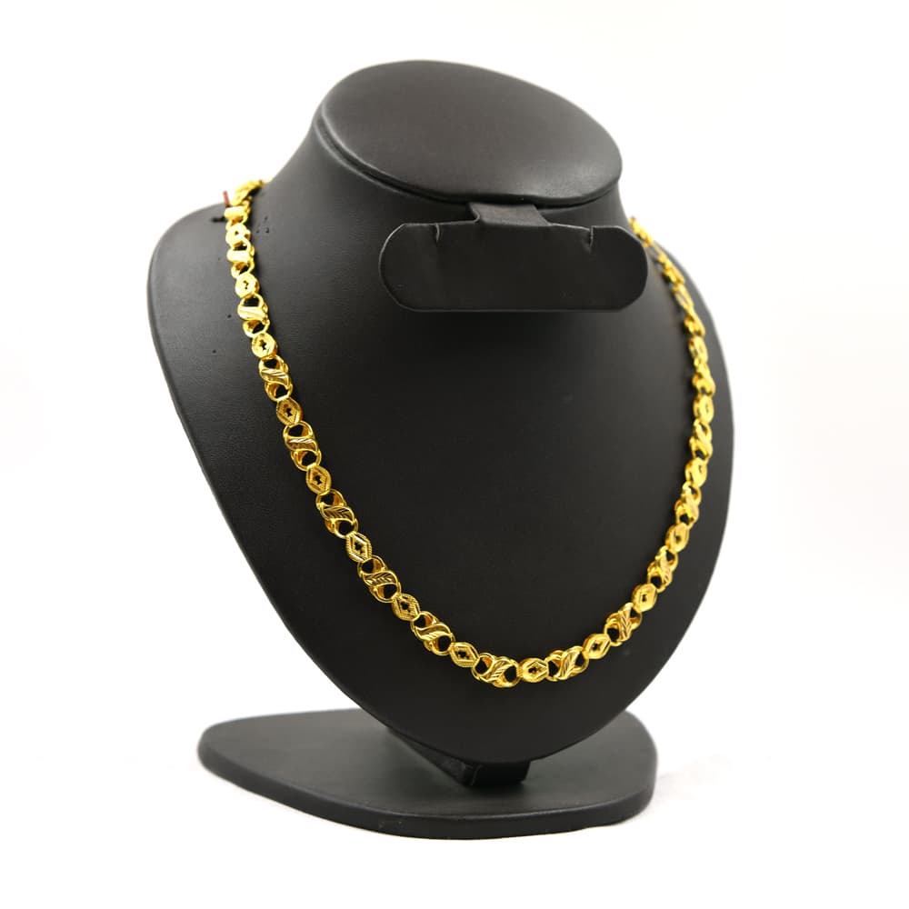 intricate gold chain with twisted oval links