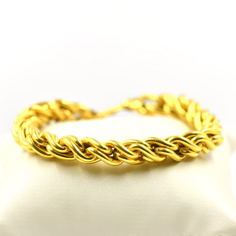 gold bracelet with thick twisted link design